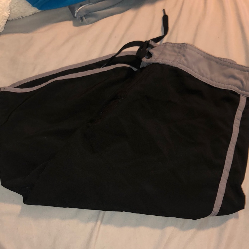 grey/black swim trunks
